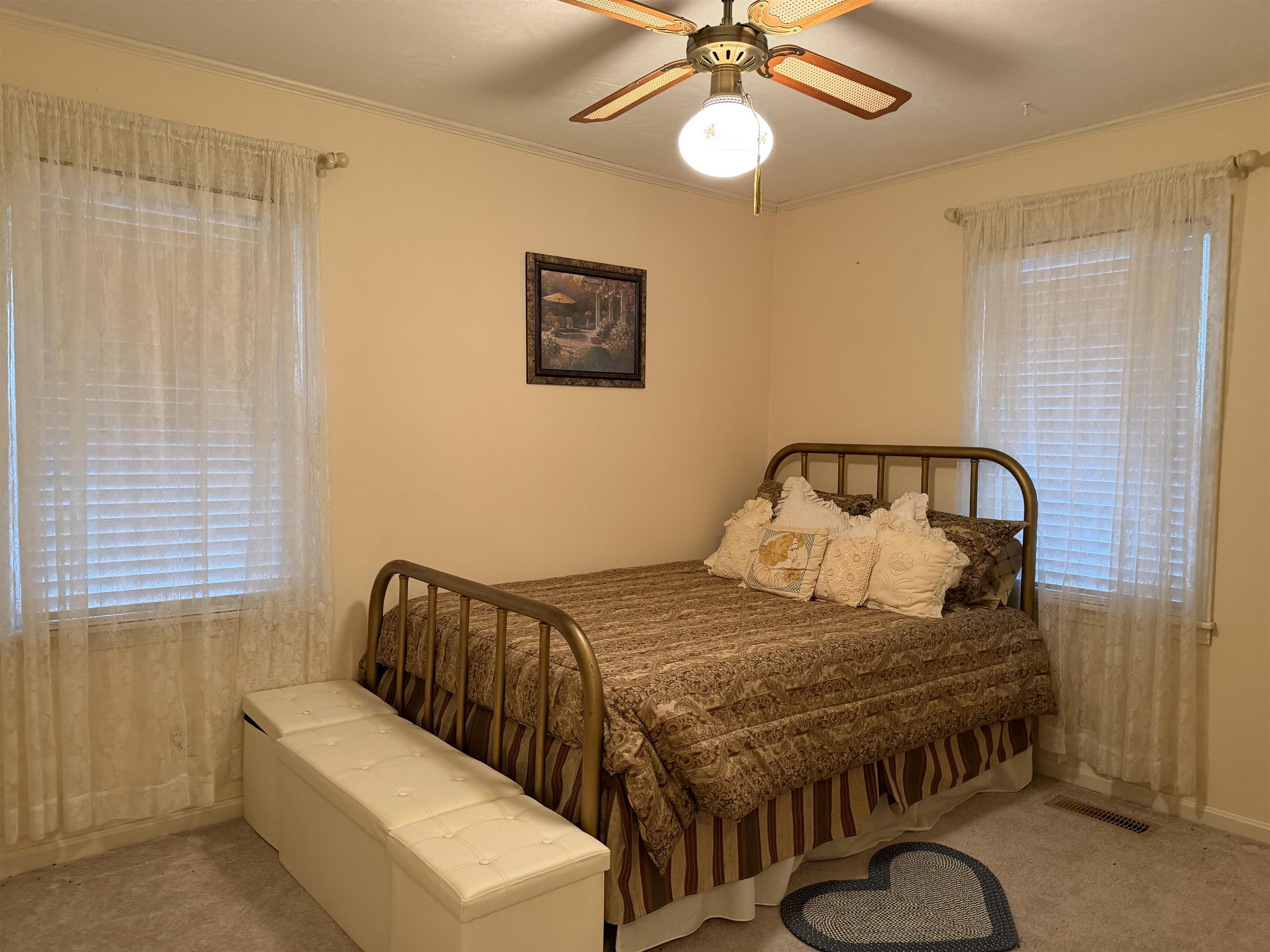 254 Michie Road Michie, TN 38357 - Photo 10 of 16 Bedroom with carpet flooring, a ceiling fan, and ornamental molding
