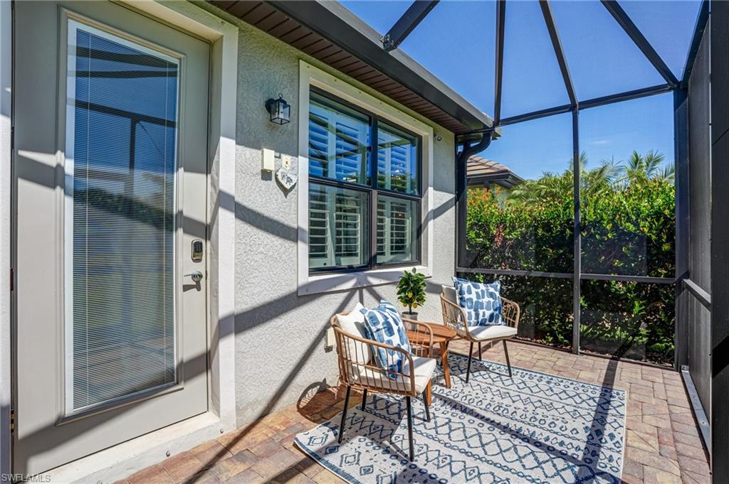 20308 Corkscrew Shores Boulevard Estero, FL 33928 - Photo 24 of 47 View of sunroom