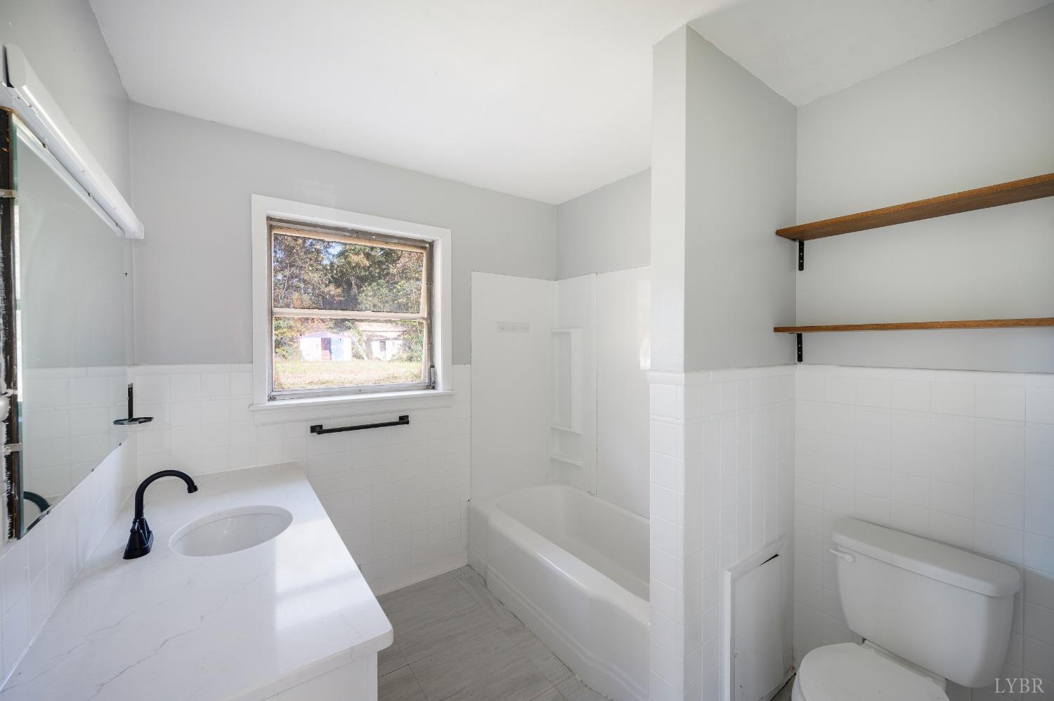 109 Hillside Road Hurt, VA 24563 - Photo 14 of 42 a bathroom with a sink toilet and bathtub