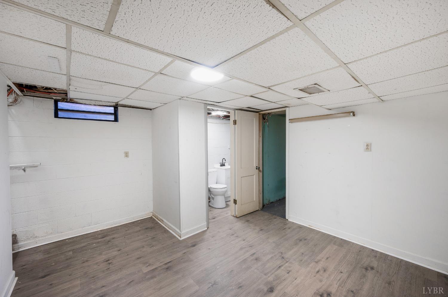 109 Hillside Road Hurt, VA 24563 - Photo 21 of 42 a view of empty room with wooden floor