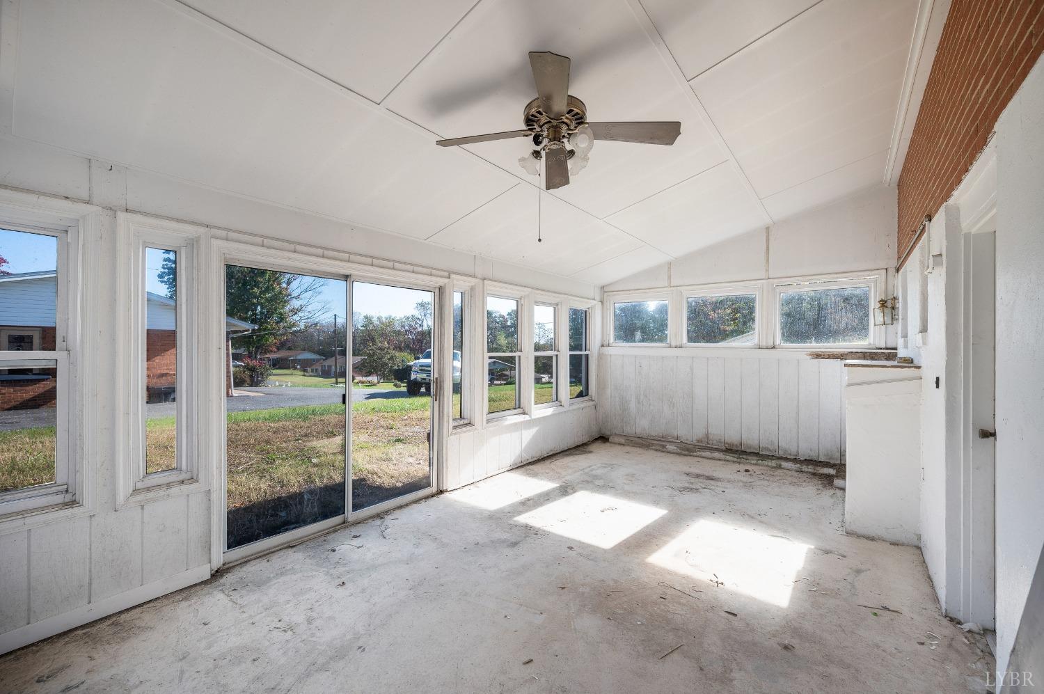 109 Hillside Road Hurt, VA 24563 - Photo 26 of 42 a view of a room with a ceiling fan and windows