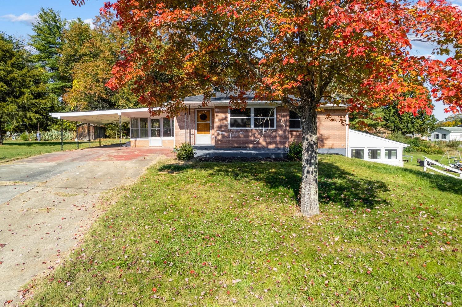 109 Hillside Road Hurt, VA 24563 - Photo 36 of 42 front view of a house with a big yard