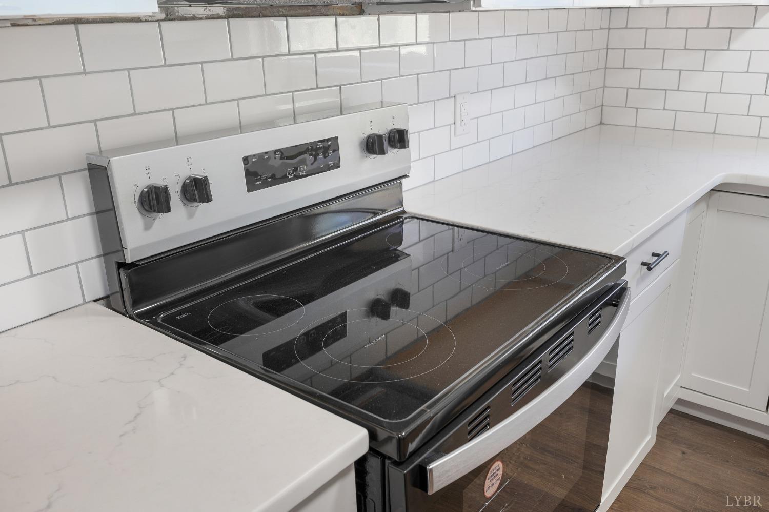 109 Hillside Road Hurt, VA 24563 - Photo 9 of 42 a stove top oven sitting inside of a kitchen