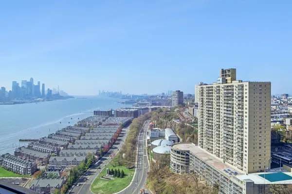 a view of city with tall buildings