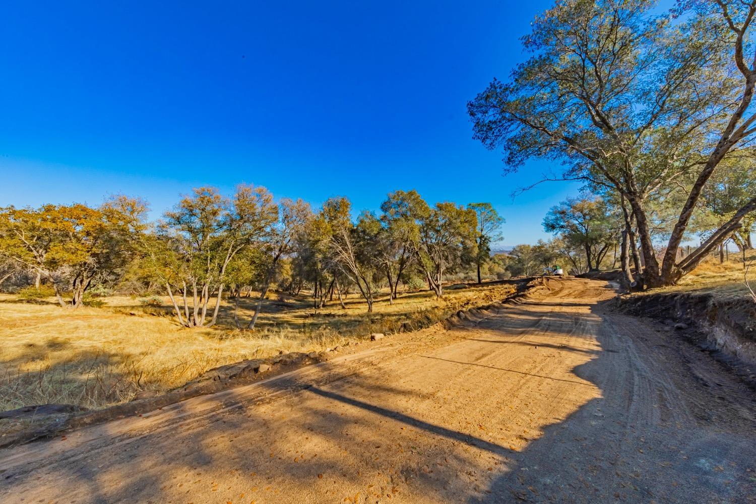 1 Jennifer Way Coarsegold, CA 93614 - Photo 16 of 17 a view of a yard with swimming pool