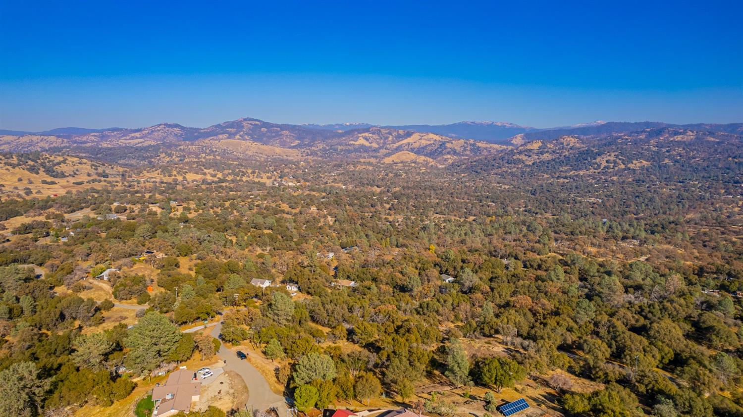 1 Jennifer Way Coarsegold, CA 93614 - Photo 10 of 17 a view of a city with mountains in the background