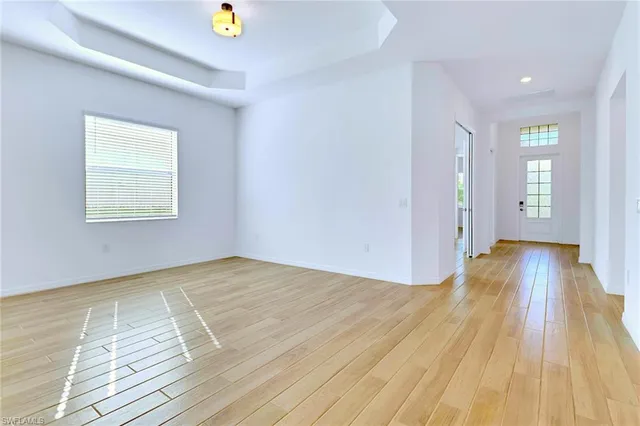 a view of an empty room and window