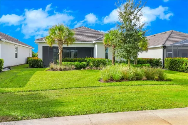 a view of a house with a garden