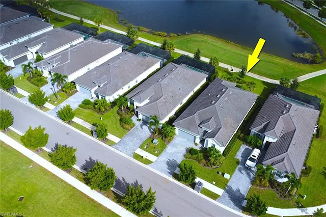 an aerial view of a house with a garden and plants
