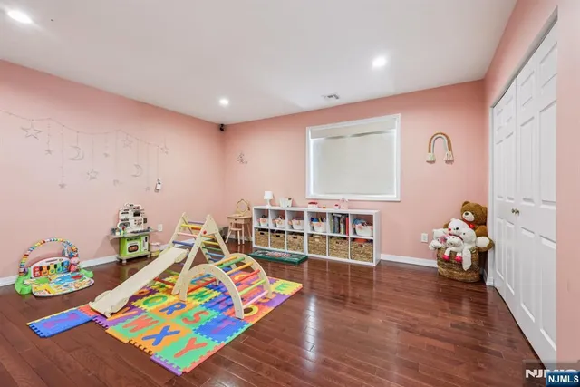 a room with furniture and a wooden floor