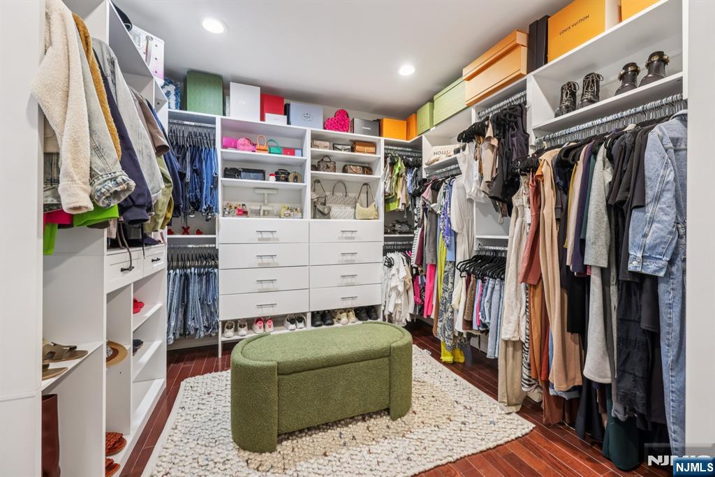 17 Maple Avenue Mahwah, NJ 07430 - Photo 28 of 36 a view of walk in closet with clothes and shoes