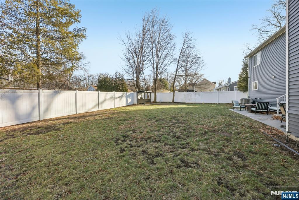 17 Maple Avenue Mahwah, NJ 07430 - Photo 33 of 36 a view of a yard with a house