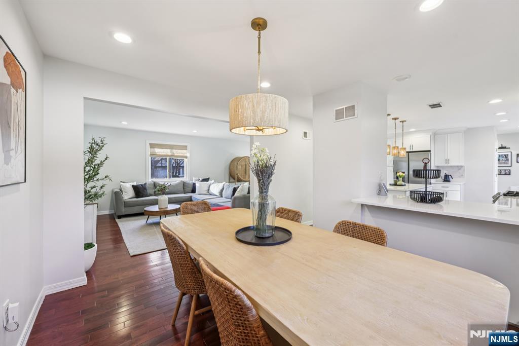 17 Maple Avenue Mahwah, NJ 07430 - Photo 9 of 36 a dining room with furniture and wooden floor