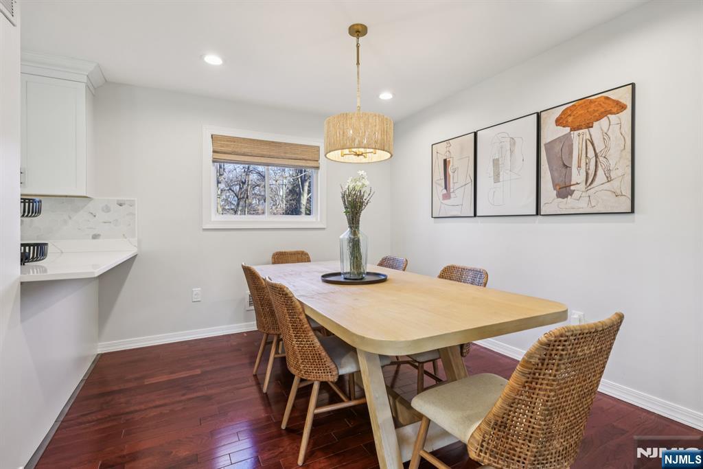 17 Maple Avenue Mahwah, NJ 07430 - Photo 10 of 36 a view of a dining room with furniture window and wooden floor