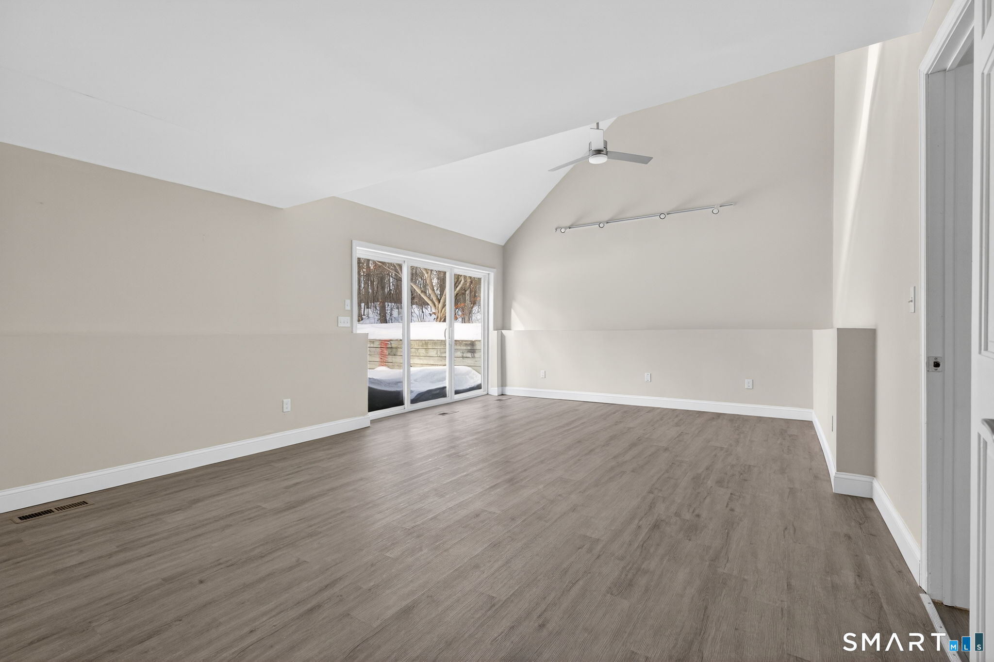 44 Chamberlain Hill Road Middletown, CT 06457 - Photo 29 of 40 an empty room with wooden floor and windows