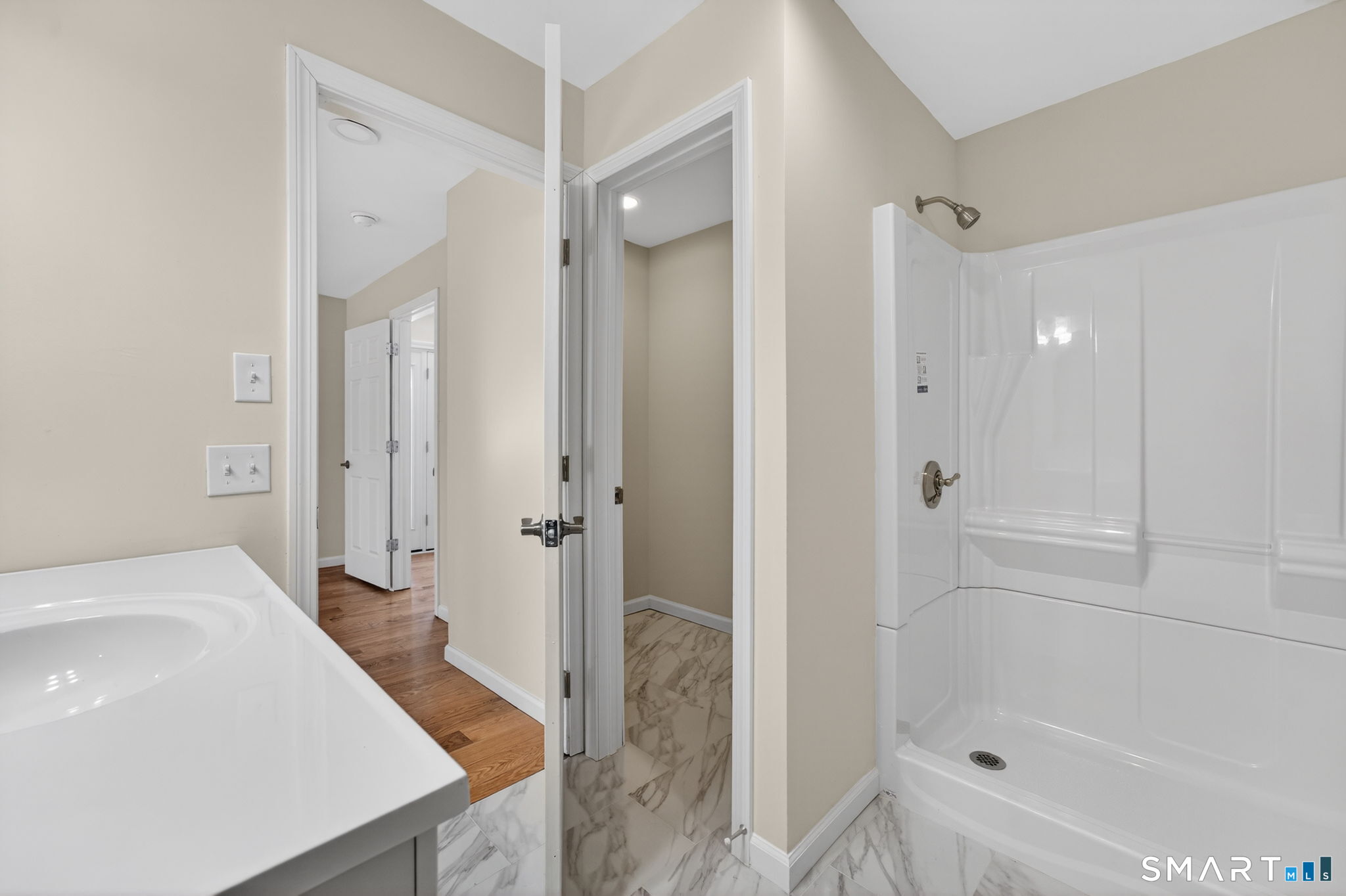 44 Chamberlain Hill Road Middletown, CT 06457 - Photo 33 of 40 a bathroom with a tub shower vanity and a sink