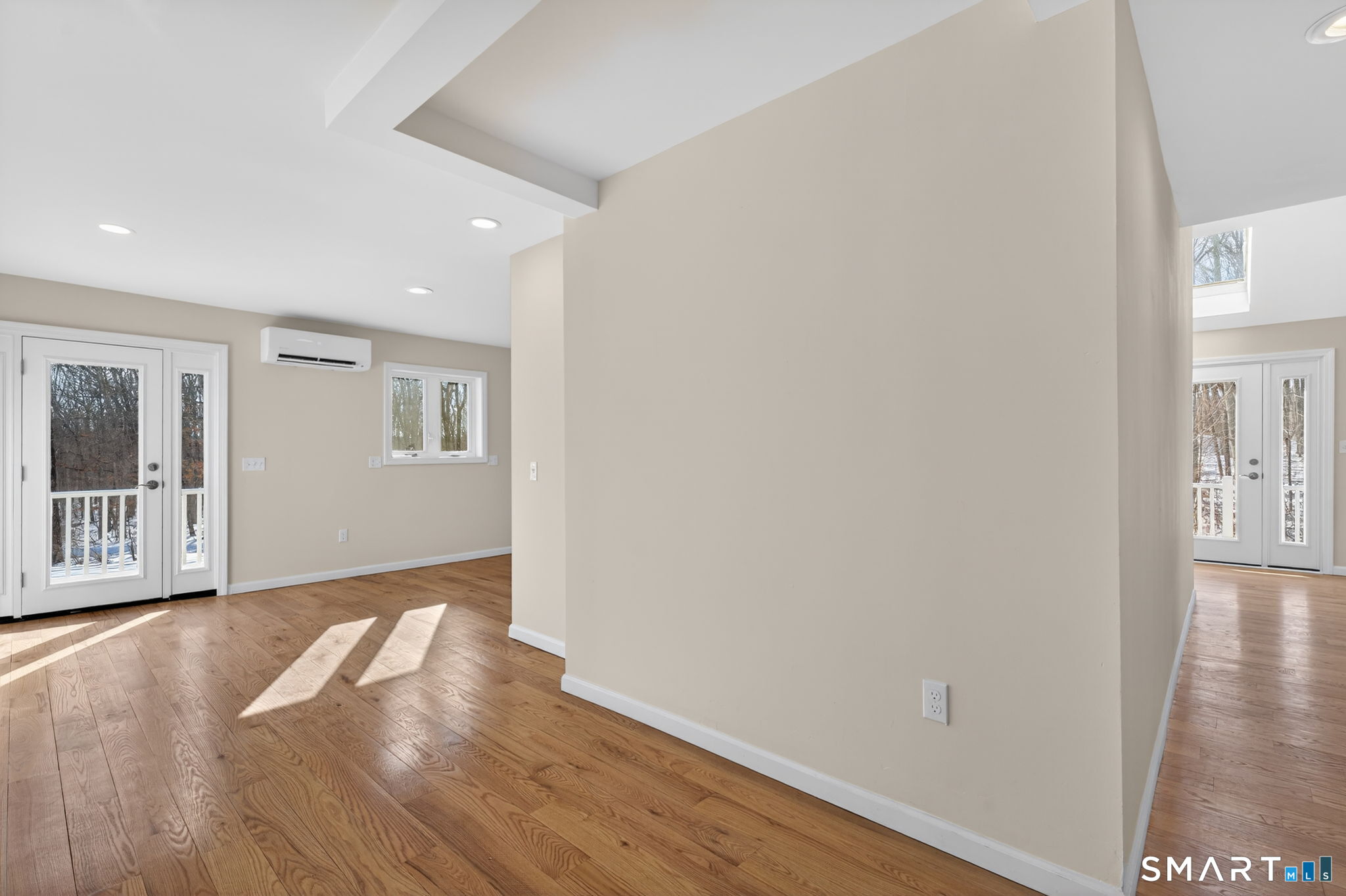 44 Chamberlain Hill Road Middletown, CT 06457 - Photo 38 of 40 an empty room with wooden floor and windows