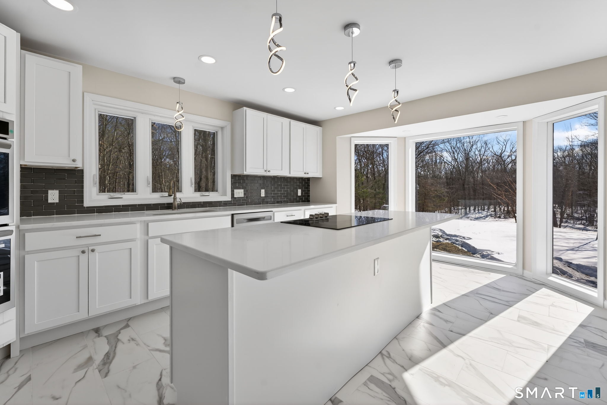 44 Chamberlain Hill Road Middletown, CT 06457 - Photo 5 of 40 a kitchen with stainless steel appliances kitchen island granite countertop a sink and cabinets