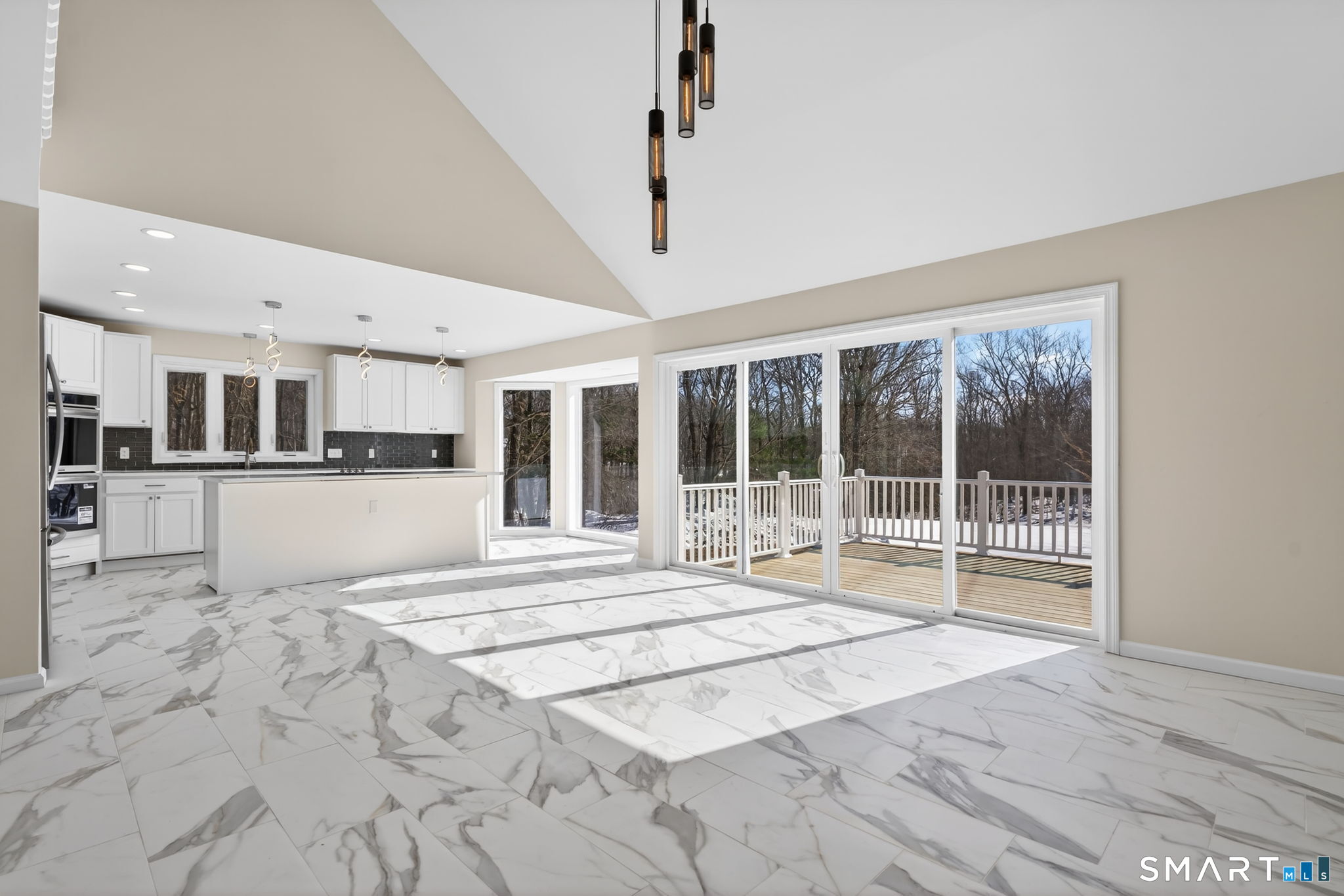 44 Chamberlain Hill Road Middletown, CT 06457 - Photo 7 of 40 a view of a kitchen with granite countertop a large window and a kitchen view