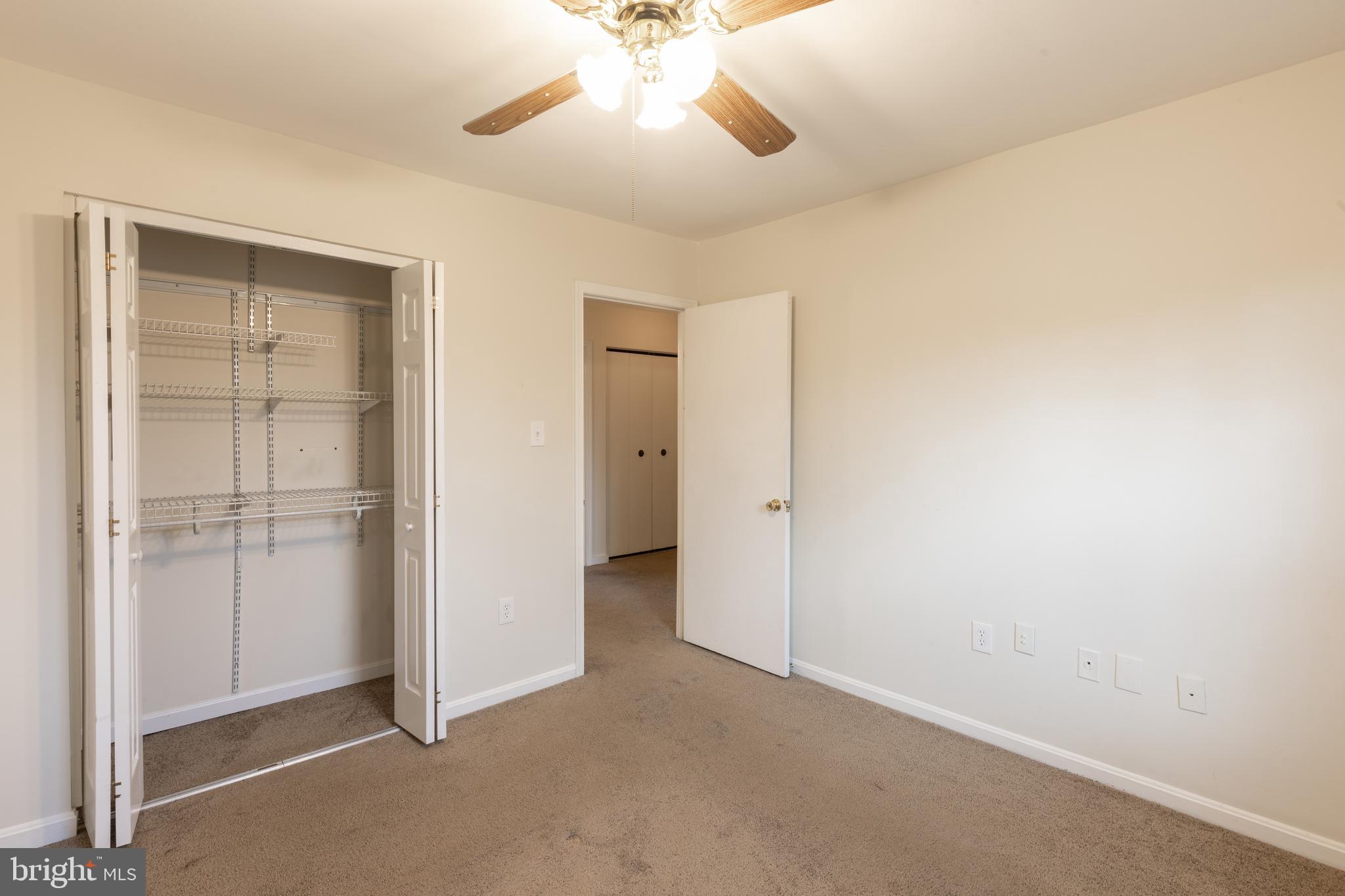 8132 Sleepy View Lane Springfield, VA 22153 - Photo 17 of 31 a view of an empty room and chandelier fan