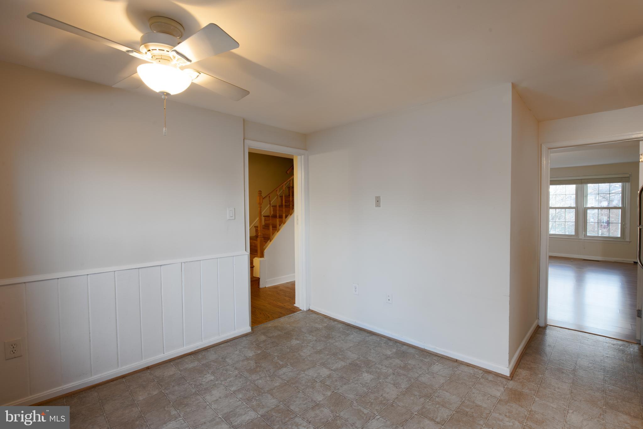 8132 Sleepy View Lane Springfield, VA 22153 - Photo 5 of 31 an empty room with closet and a chandelier fan