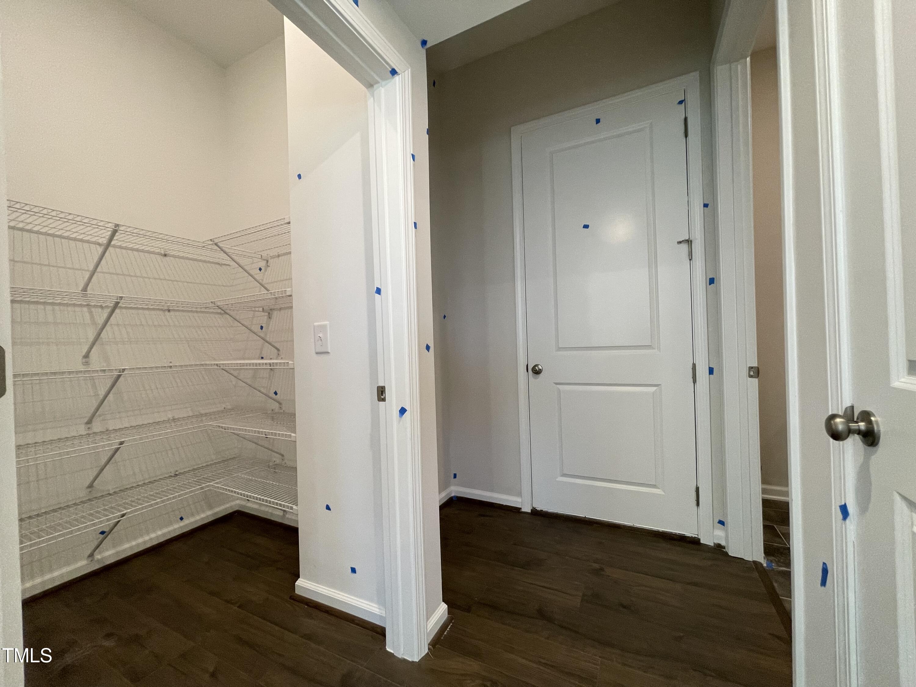 548 Marthas View Way Wake Forest, NC 27587 - Photo 14 of 44 a view of an empty room with wooden floor and closet