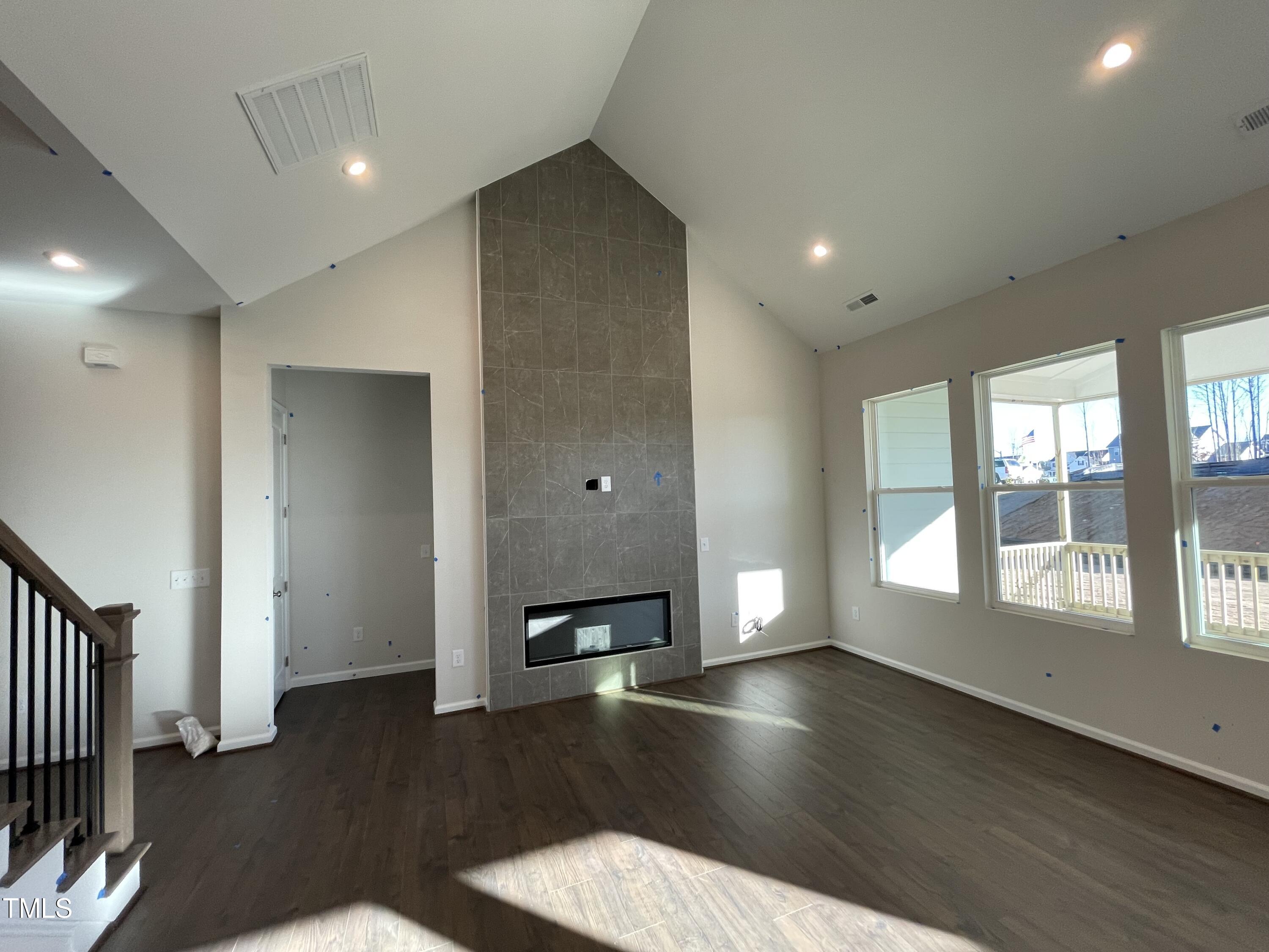 548 Marthas View Way Wake Forest, NC 27587 - Photo 19 of 44 a view of empty room with wooden floor and fan