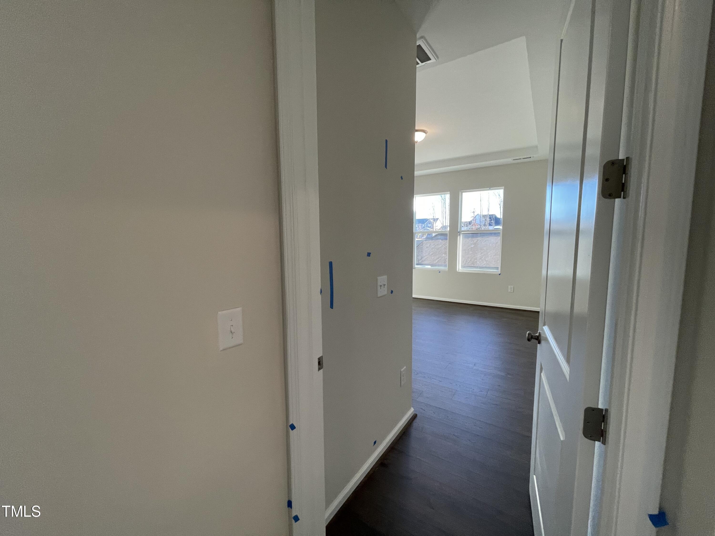 548 Marthas View Way Wake Forest, NC 27587 - Photo 21 of 44 a view of a hallway with wooden floor