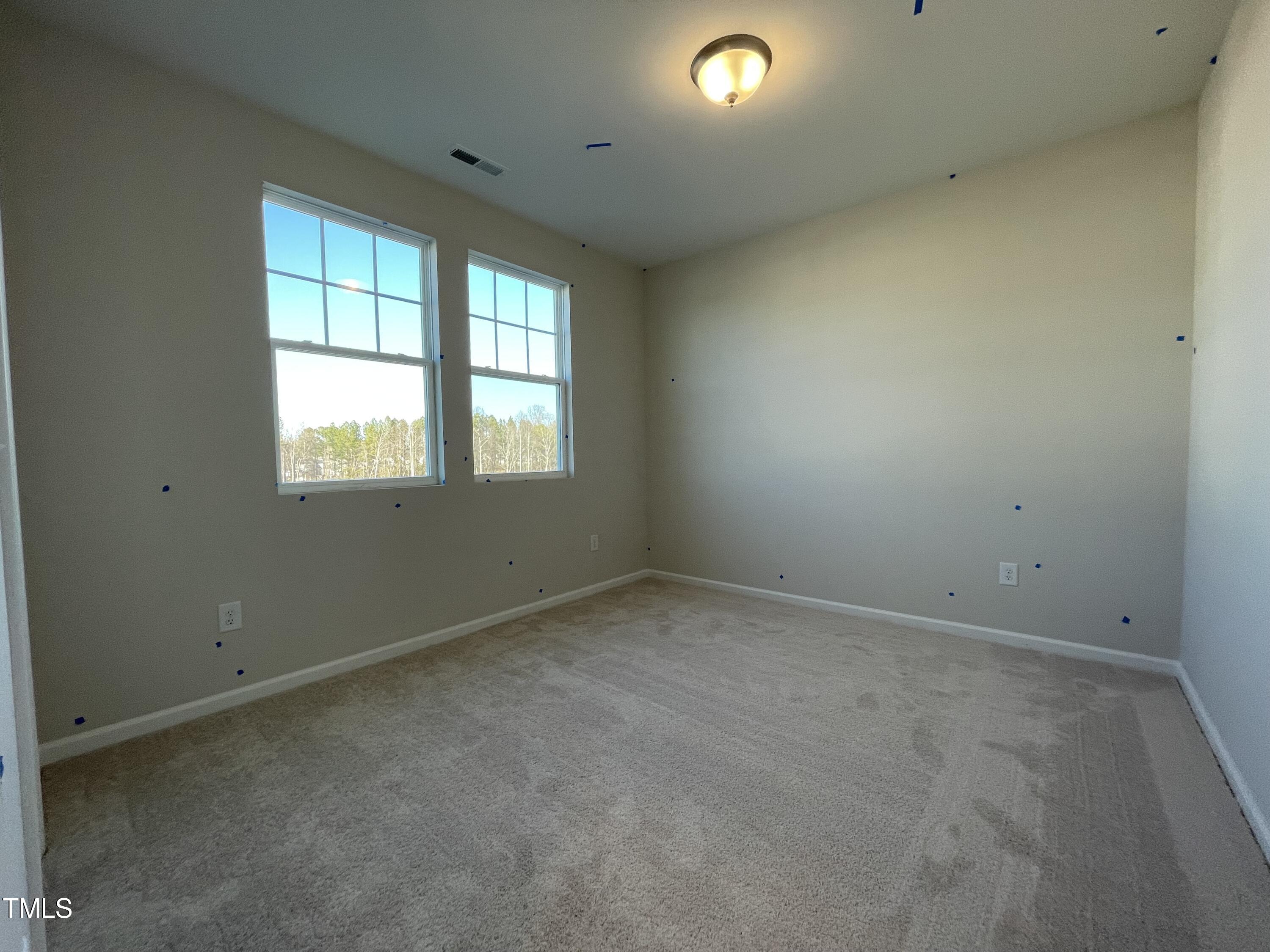 548 Marthas View Way Wake Forest, NC 27587 - Photo 30 of 44 an empty room with a window