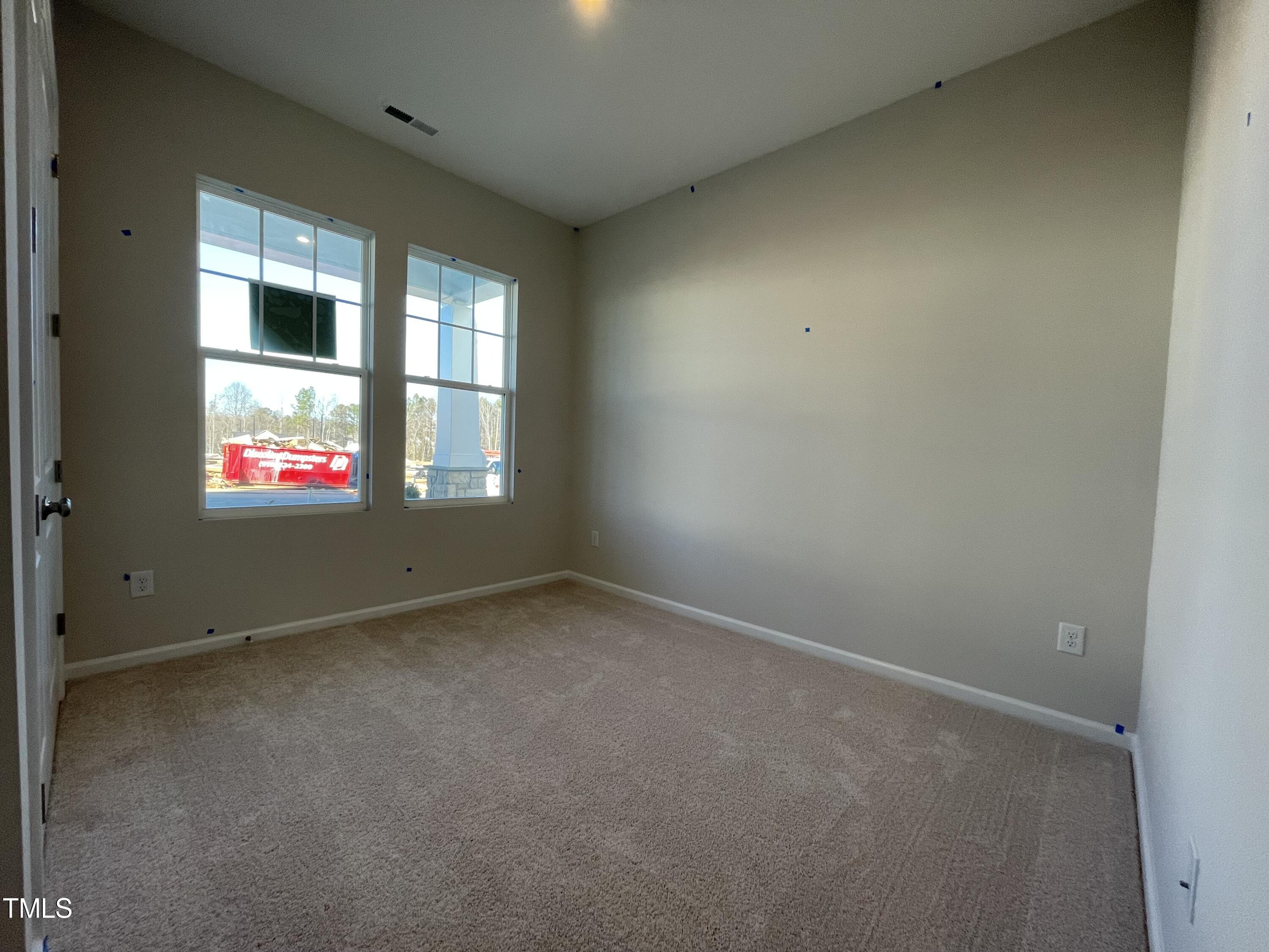 548 Marthas View Way Wake Forest, NC 27587 - Photo 4 of 44 an empty room with windows