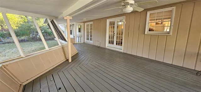 a view of a house with wooden floor and furniture