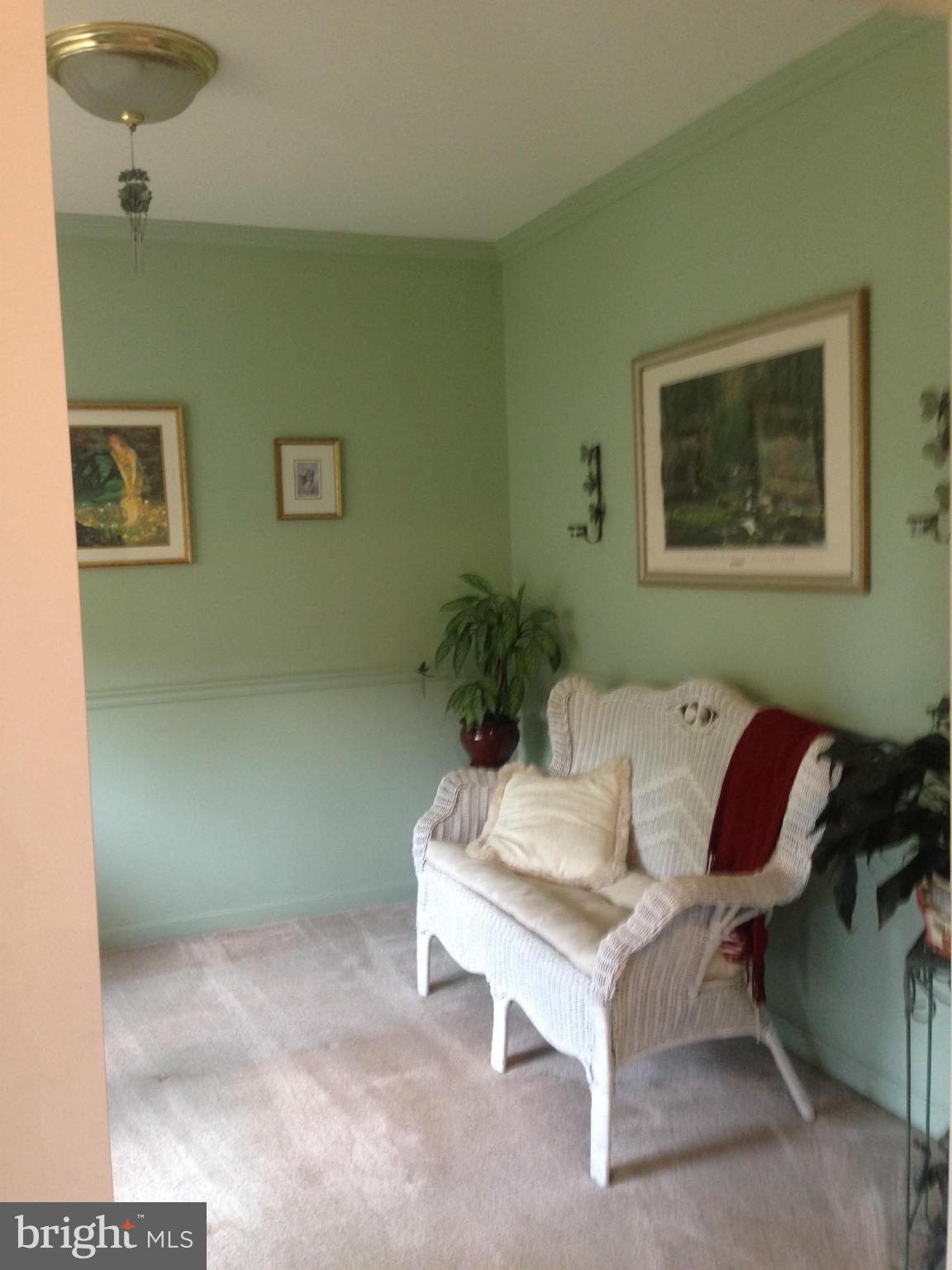 1801 Lottie Fowler Road Prince Frederick, MD 20678 - Photo 17 of 21 a living room with furniture and a rug