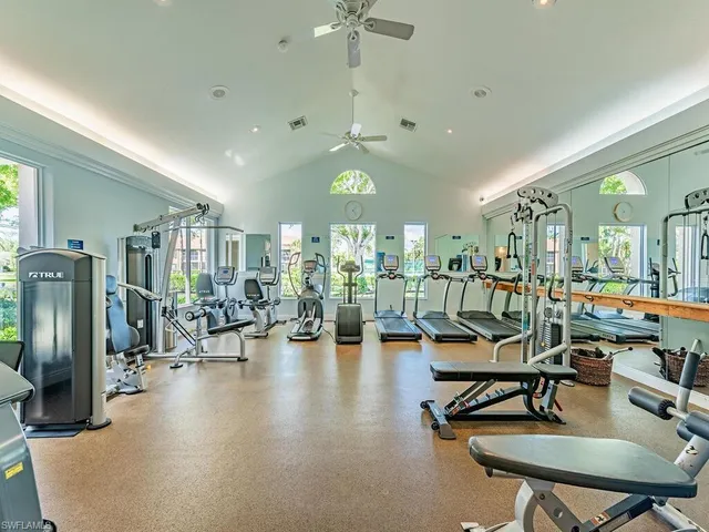 a view of a livingroom with furniture and a chandelier