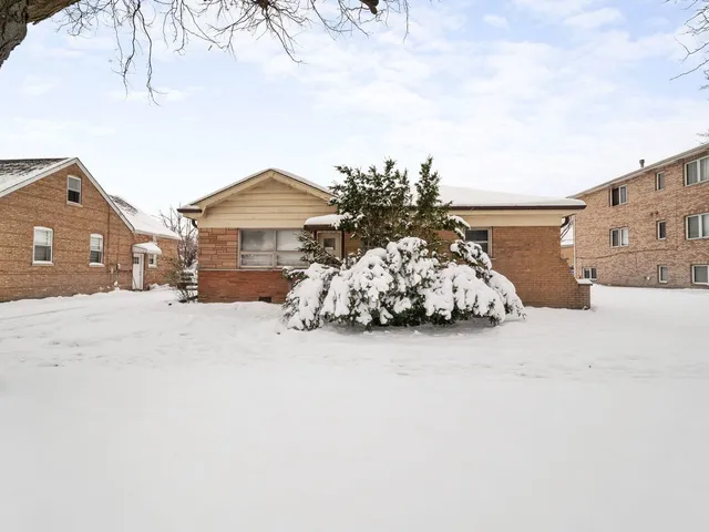 a car parked in front of a house