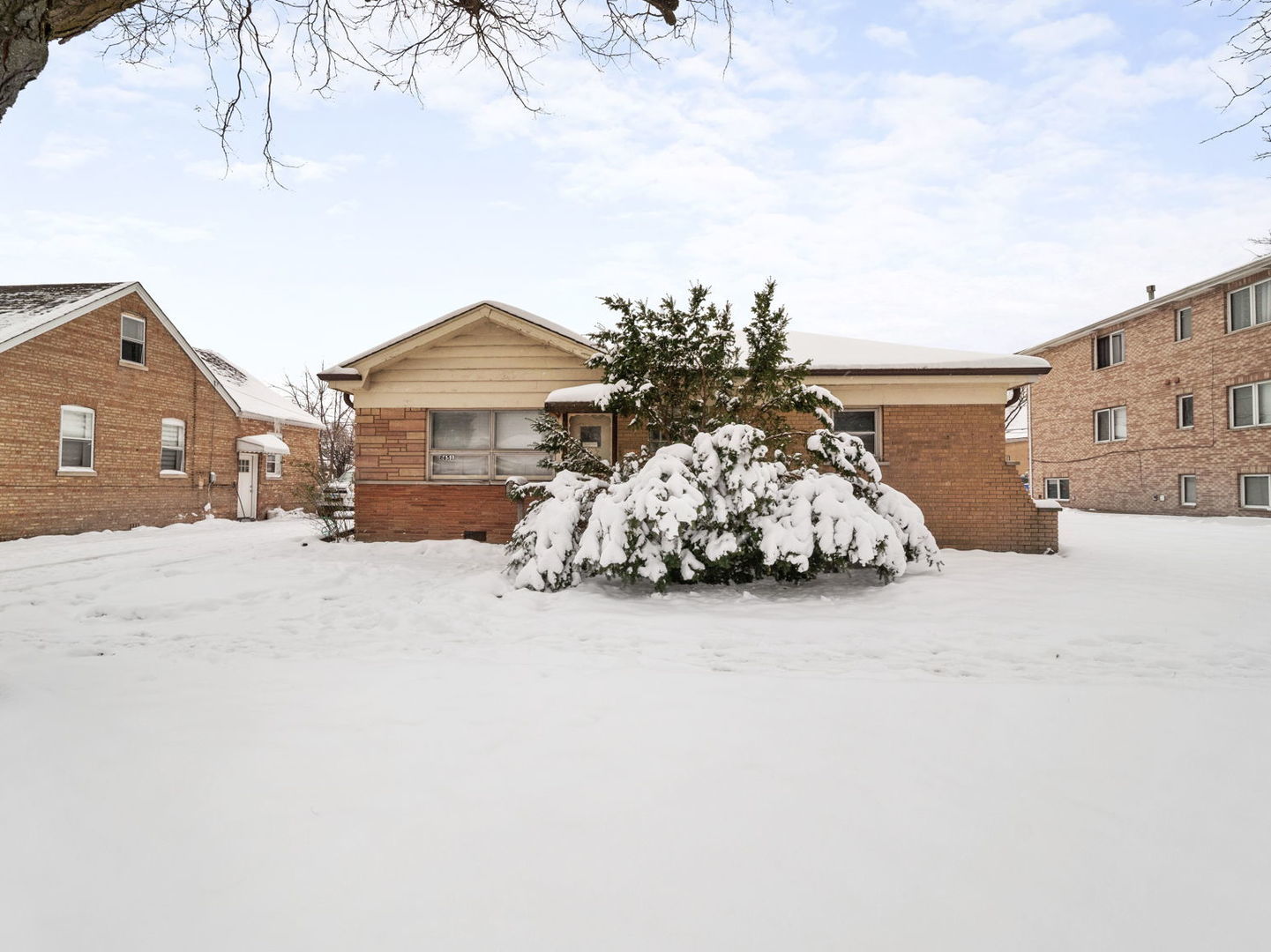 a car parked in front of a house