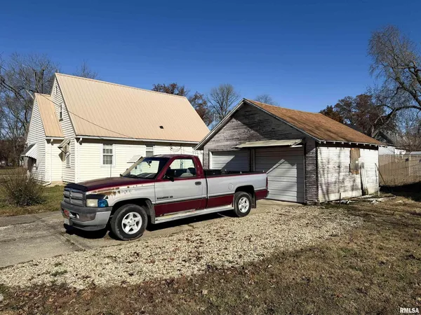 a car parked in front of a house