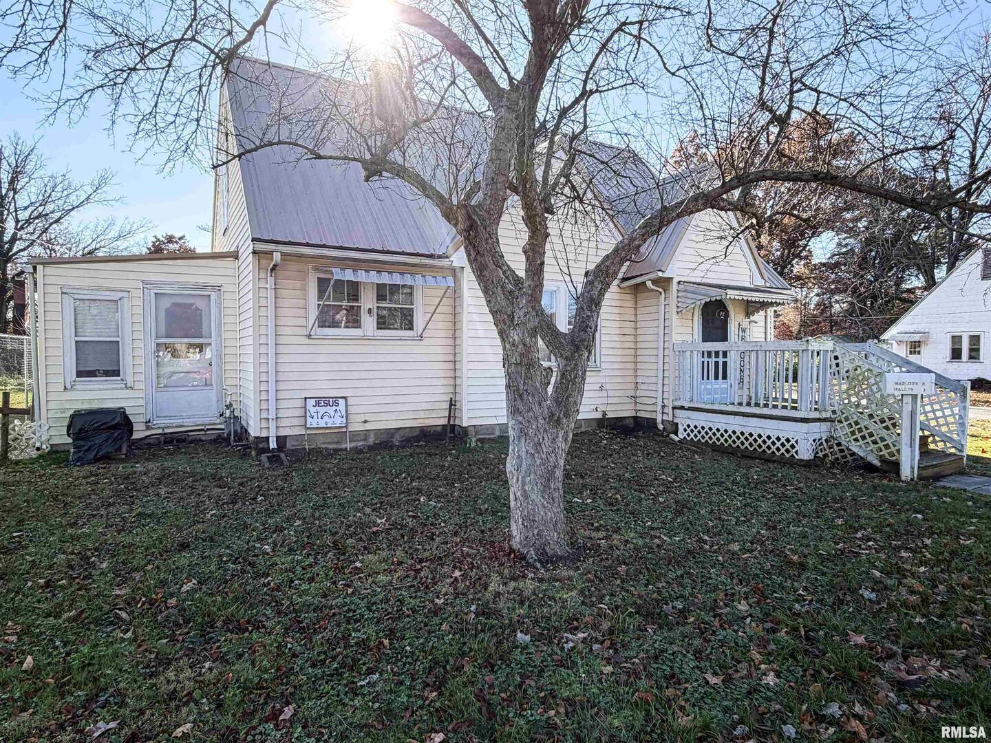 601 East Lafayette Street Olney, IL 62450 - Photo 40 of 45 a house that has a tree in front of it