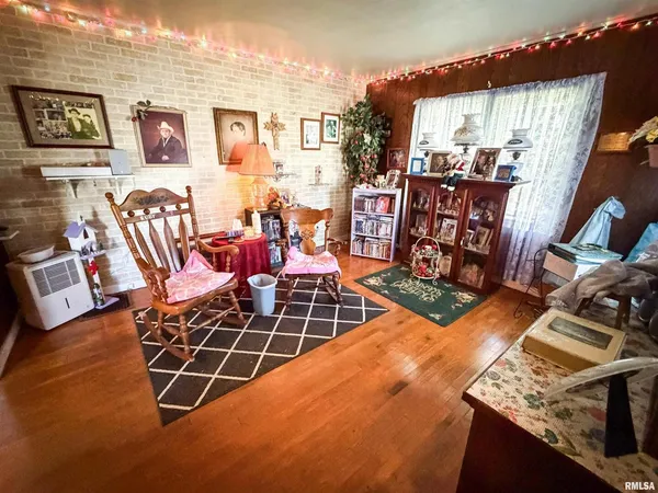 a view of a livingroom with furniture and window
