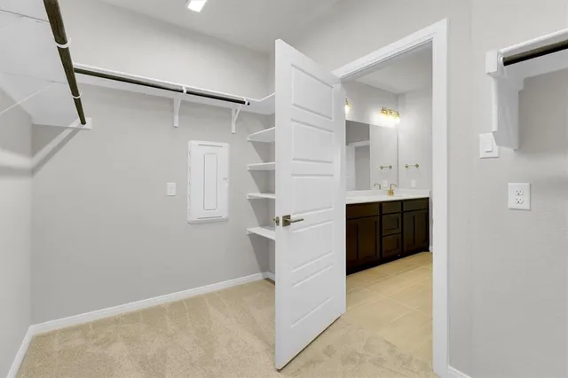 a view of a kitchen with a sink