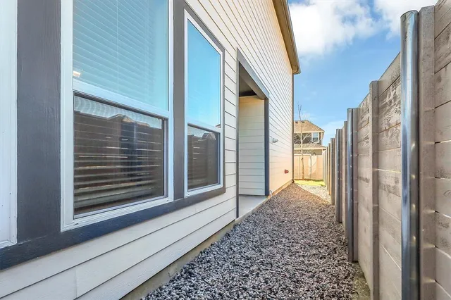 a view of a house with a door and balcony