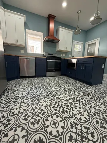 a room with a door open to a room