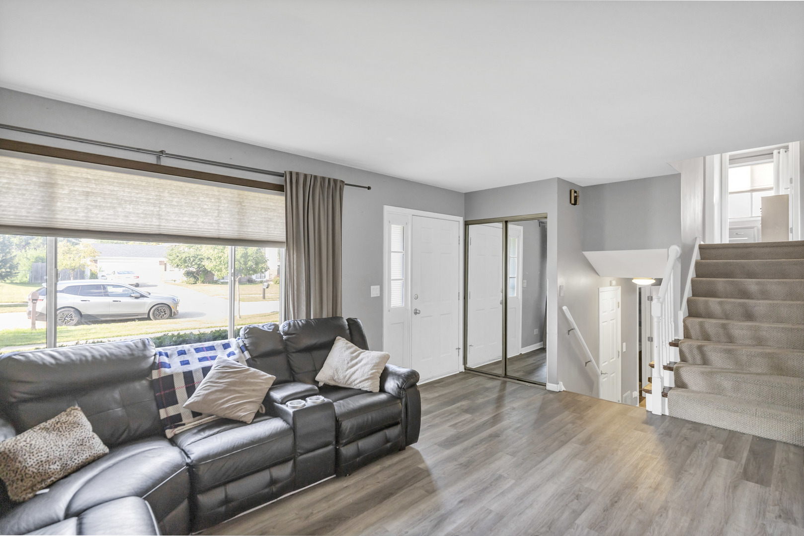 2315 Stepstone Lane Hanover Park, IL 60133 - Photo 13 of 30 a living room with furniture and a large window