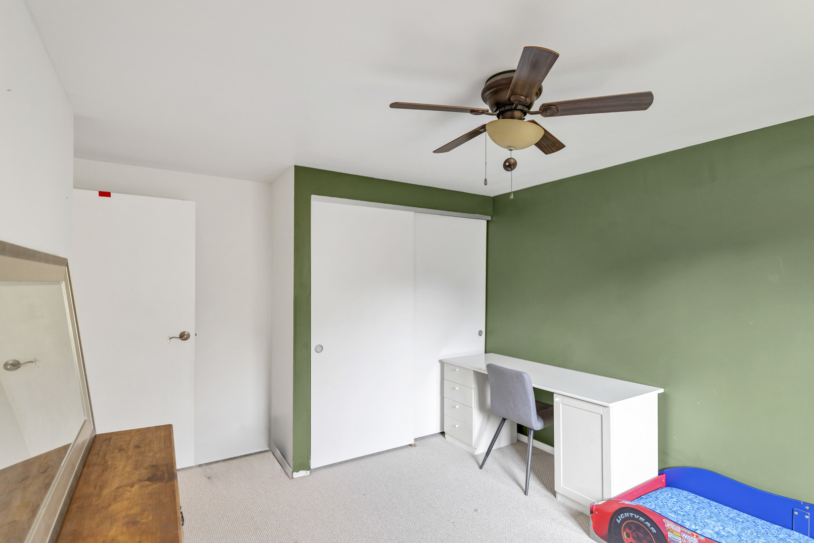 2315 Stepstone Lane Hanover Park, IL 60133 - Photo 17 of 30 a room with a ceiling fan and a window