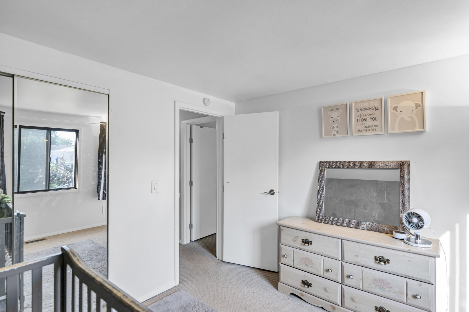 2315 Stepstone Lane Hanover Park, IL 60133 - Photo 19 of 30 a room with mirror and furniture