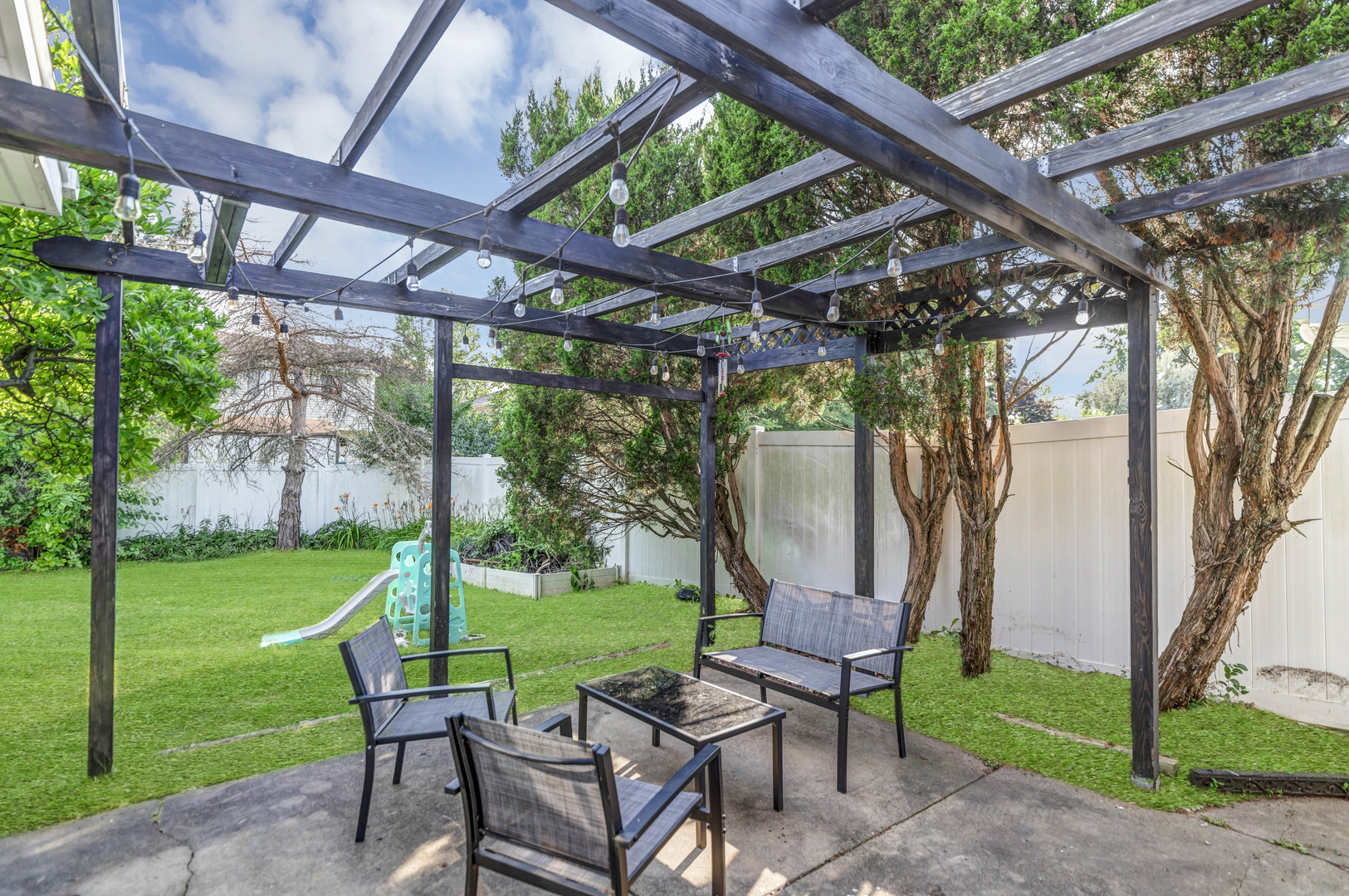 2315 Stepstone Lane Hanover Park, IL 60133 - Photo 28 of 30 a view of a chairs in backyard of the house