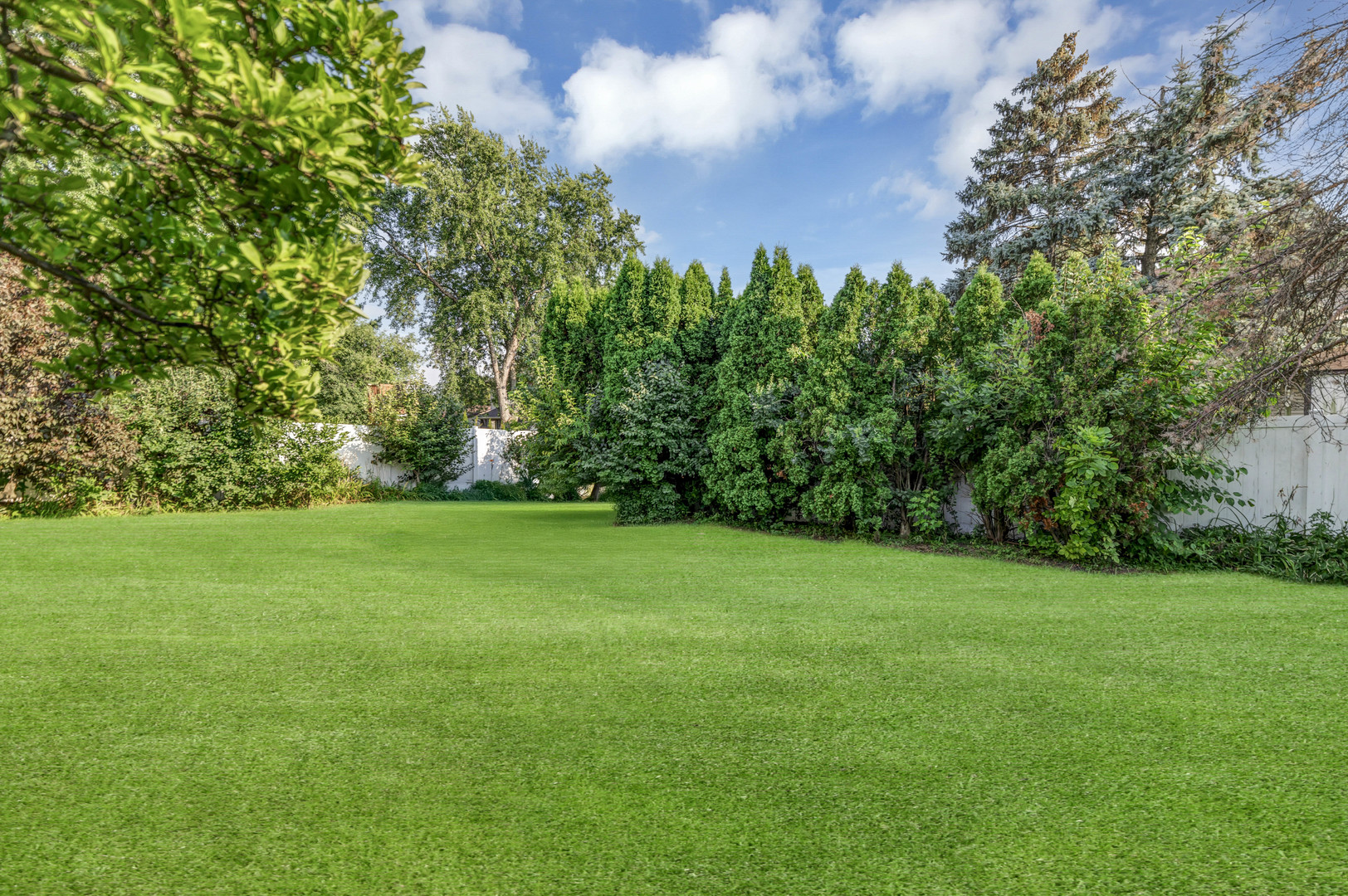 2315 Stepstone Lane Hanover Park, IL 60133 - Photo 29 of 30 a view of a grassy field with trees