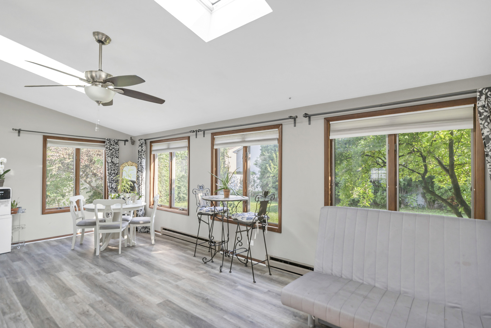 2315 Stepstone Lane Hanover Park, IL 60133 - Photo 9 of 30 a living room with furniture and large windows