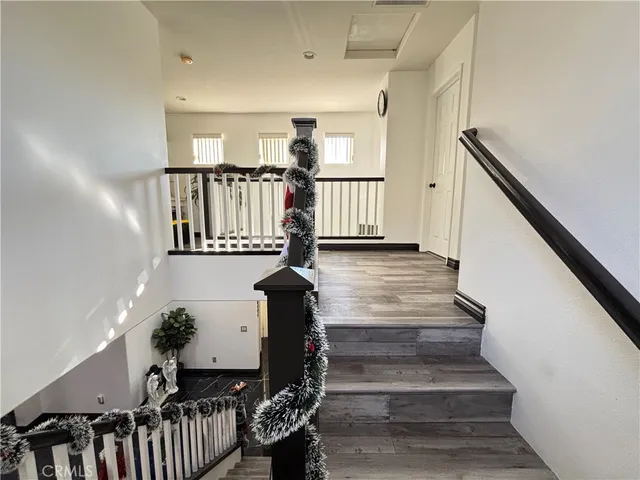 a bathroom with a sink vanity and a mirror