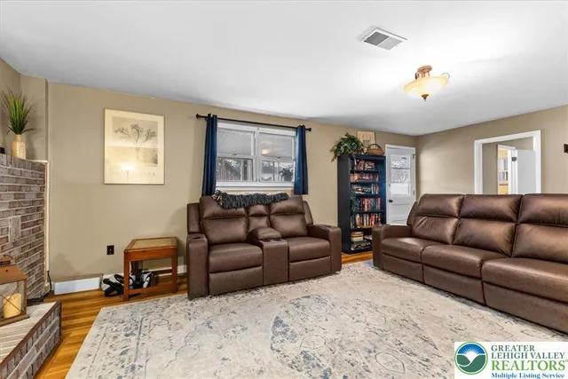 a living room with furniture and a couch
