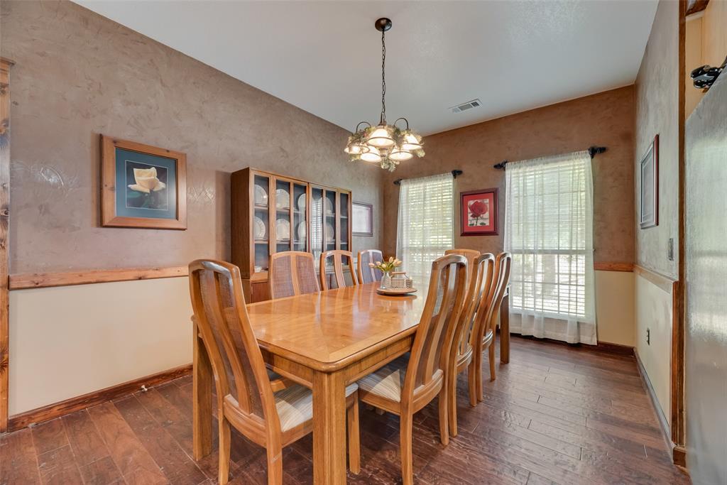 82 Trail Ridge Drive Melissa, TX 75454 - Photo 11 of 29 Dining room featuring dark wood floors and room for a large table